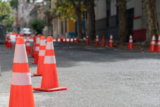 istock Orange traffic cones creating a barrier for vehicles. 2205779392