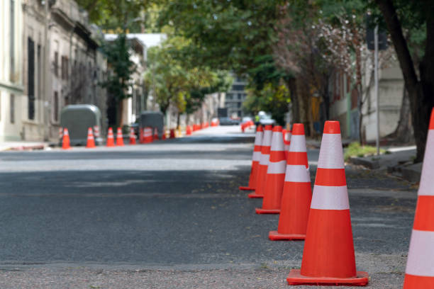 Traffic cones creating a barrier on a city street