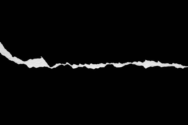 istock Ripped torn paper edges isolated on black background 2205781599