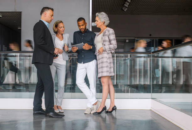 istock Diverse Business Professionals Engaging at Conference 2205781714