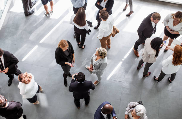 istock Diverse Professionals Engaging in Lively Business Conference 2205781729
