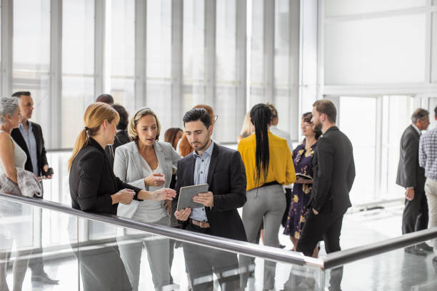 istock Diverse Professionals Engaged in Business Conference Discussion 2205781750