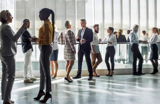 istock Diverse Business Professionals Engaging in Conference Networking 2205781764