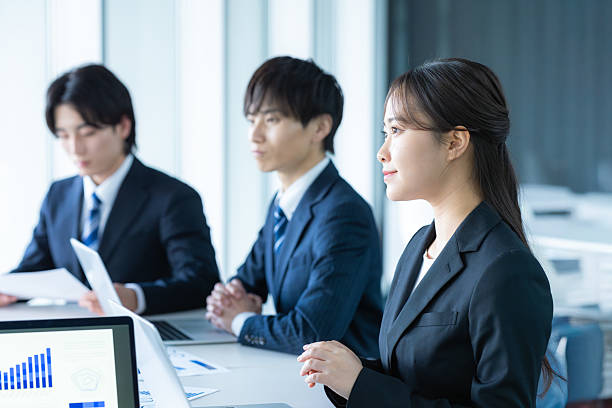 istock young businessmen having a meeting 2205796919