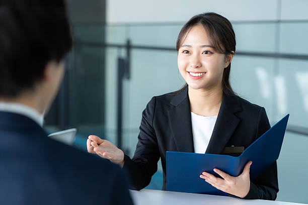 istock Consultant woman at reception 2205796953