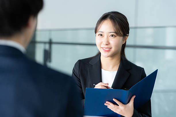 istock Consultant woman at reception 2205796957