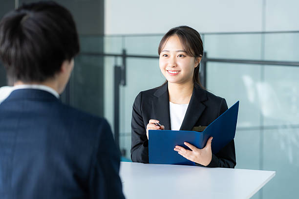 istock Consultant woman at reception 2205796960