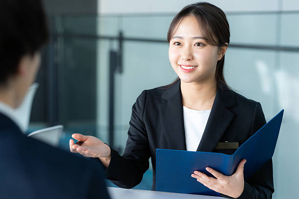 istock Consultant woman at reception 2205796961