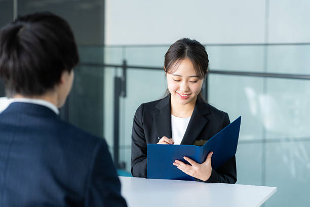 istock Consultant woman at reception 2205796967