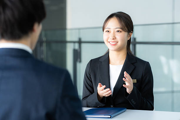 istock Consultant woman at reception 2205796972
