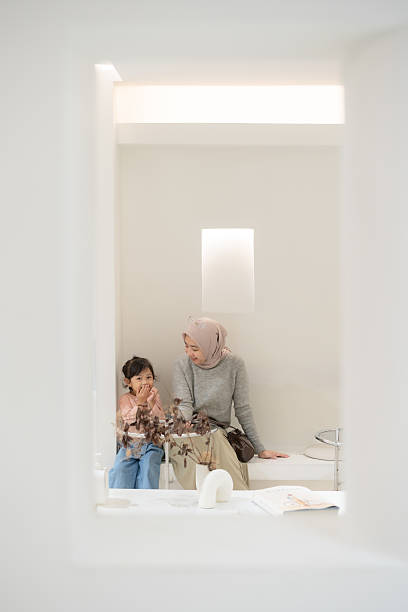 istock Happy Mother and Daughter in Cafe 2205807313