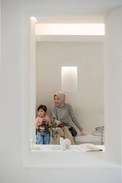 istock Happy Mother and Daughter in Cafe 2205807317