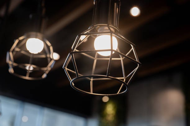 istock A minimalist design chandelier in an open iron frame. 2205811666