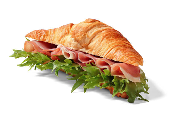istock croissant sandwich with jamon and lettuce on white 2205812609