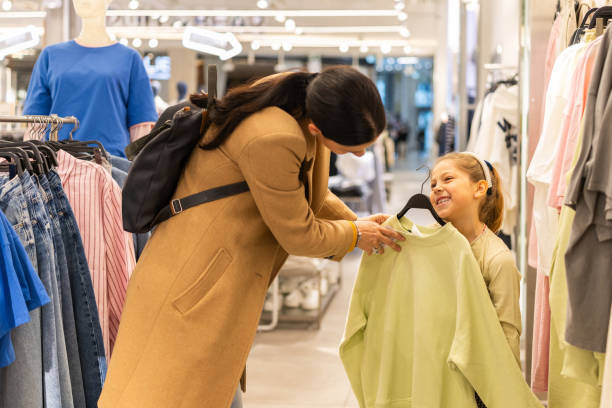 istock Choosing clothes for her little girl 2205814010