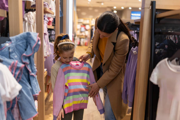 istock Choosing clothes for her little girl 2205814084
