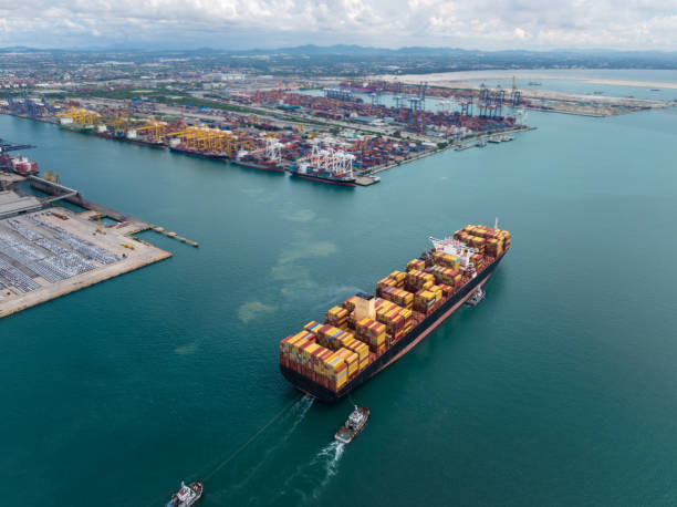 istock cargo container ship carrying sailing in sea import export goods and distributing products to dealer consumers across Asia pacific and worldwide global business transportation by container ship, 2205817143