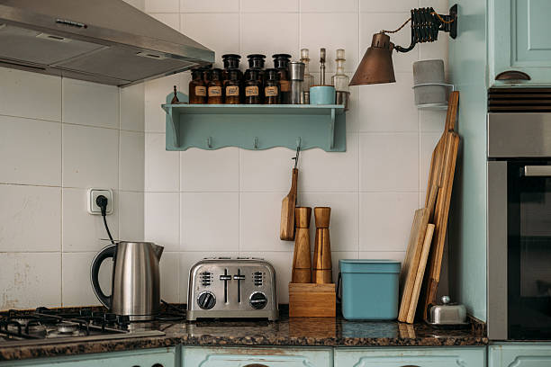 istock Vintage-style kitchen counter with wooden accessories and rustic elements 2205818176