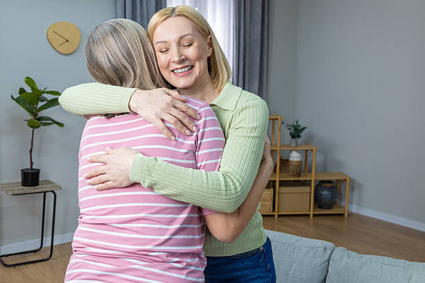 istock Two women spending time together and feeling enjoyed and pleased 2205818869