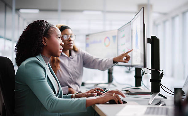 istock Female Corporate Analyst Managing Market Data 2205819062