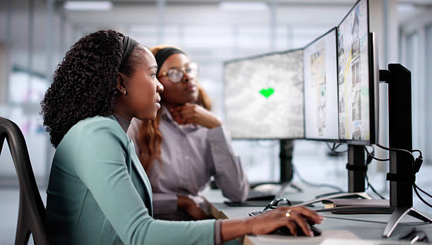 istock African American woman uses technology 2205819096