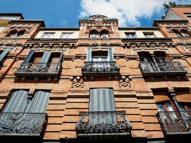 istock Ornate brick facade with iron balconies in Madrid, Spain. 2205825150