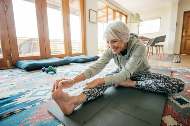 istock Fitness at Any Age: Senior woman Exercising at Home 2205827119