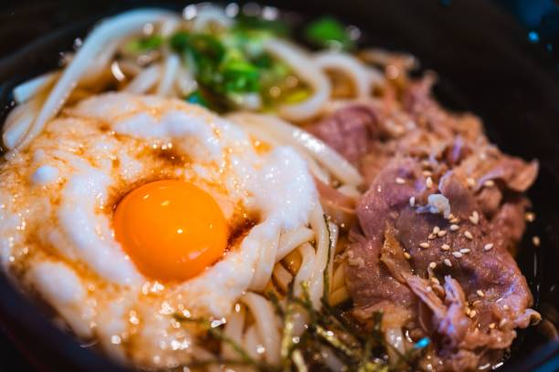 istock Japanese Udon Noodle Dish with Raw Egg and Beef 2205827300