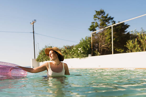 istock Summer days by the swimming pool 2205827799