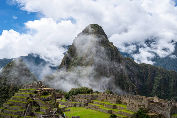 istock Panoramic view of Machu Picchu ruins surrounded by misty mountains, Peru 2205830650