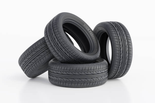 istock Four Modern Car Tires Stacked in a Minimalist Studio Setting 2205847842