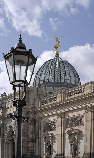 istock Historic domed building with golden statue and lamp post. 2205849886