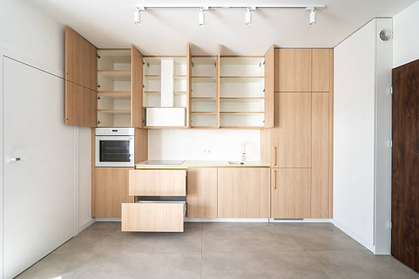 istock Modern wooden kitchen in a stylish apartment with minimalist design elements 2205860565