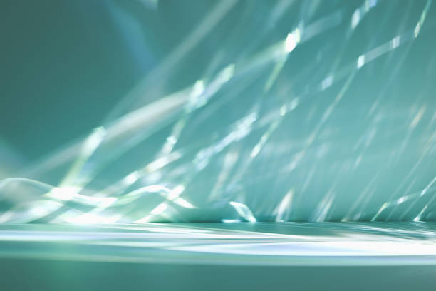 3D scene with caustic light reflections on a wall, designed for beauty product showcase. A serene and elegant backdrop, perfect for highlighting luxury and beauty themes in digital presentations.