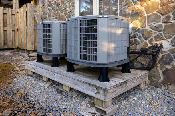 istock Home Air Heat Pumps - Heat Pump Compressors on Raised Platform - AC Cooling 2205868507