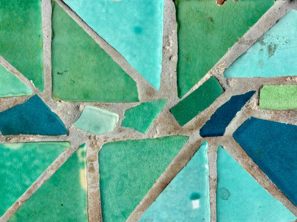 istock Green and blue color broken ceramic tiles mosaic isolated close-up, texture 2205869142
