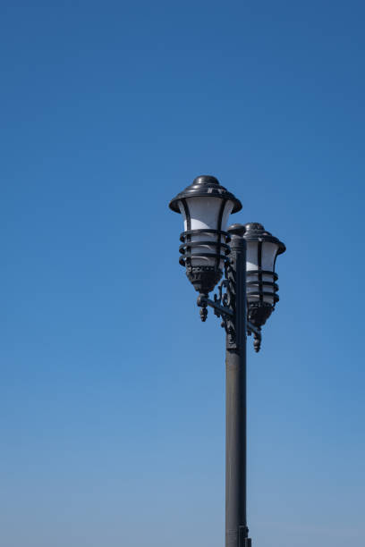 istock Decorative street lamp. Blue sky in the background. 2205873412