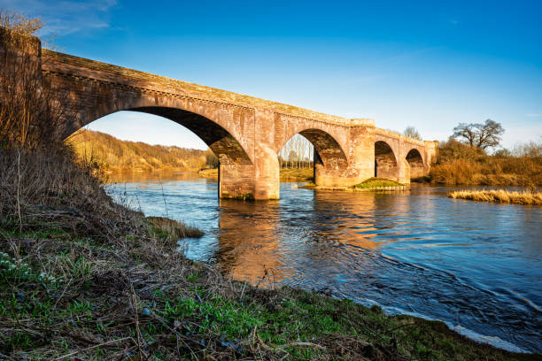 istock Ladykirk and Norham Bridge spans the River Tweed 2205873855