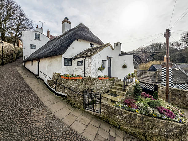Charming stone cottage nestled in, green countryside landscape. Peak District national park UK.