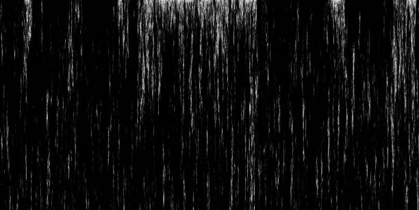 Full frame of raindrops falling on a black background. overlay