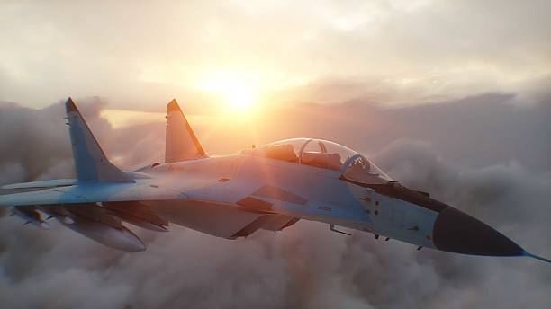 istock Russian military fighter jet MIG -35 flying over clouds. Air force. 2205879114