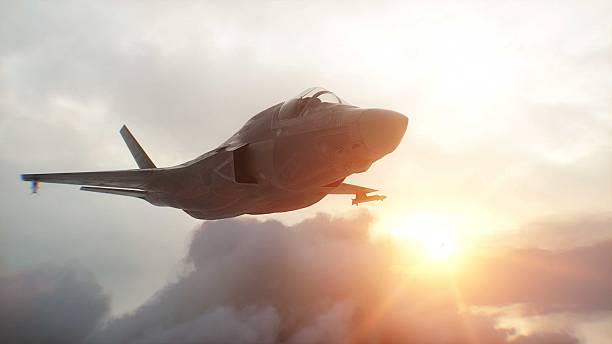 istock Military fighter jet F-35 flying over clouds. Air force. 3d rendering. 2205880203