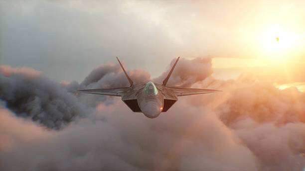 istock Military fighter jet F-22 flying over clouds. Air force. 3d rendering. 2205880795