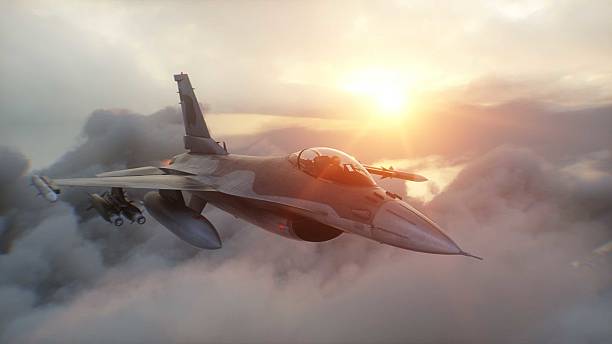 istock Military fighter jet F-16 flying over clouds. Air force. 3d rendering. 2205880899