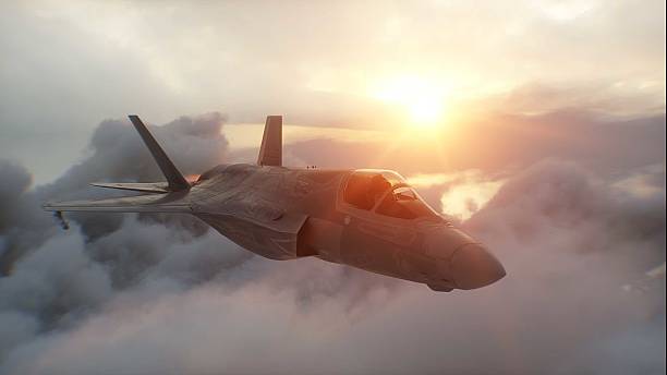 istock Military fighter jet F-35 flying over clouds. Air force. 3d rendering. 2205885113