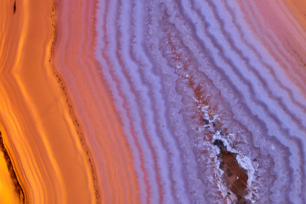 istock Agate macro detail. close-up of a textured semi-precious gemstone background. backlight transparency 2205885979