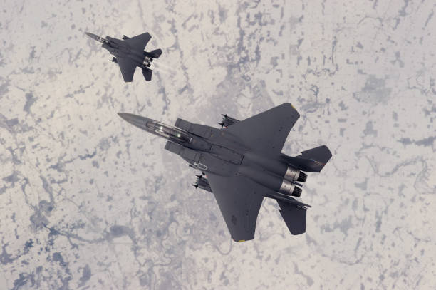 istock Air Force Fighter Jets flying over clouds. High Above The Clouds. 2205888624