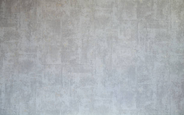 istock Gray textured wall creates a modern, minimalist backdrop for design 2205888858