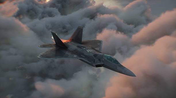 istock Military fighter jet F-22 flying over clouds. Air force. 3d rendering. 2205890421