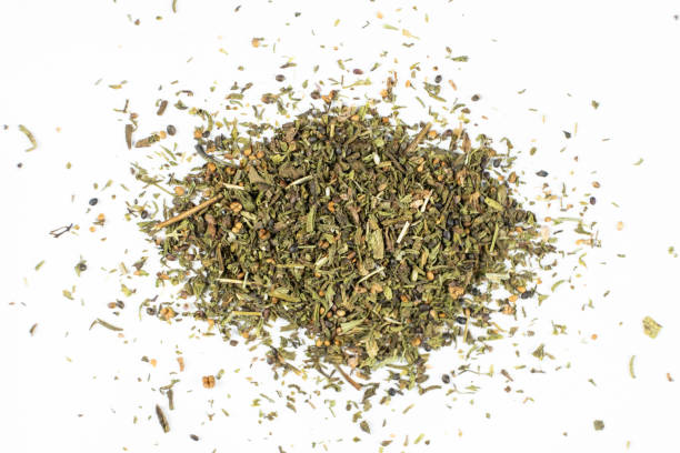 istock Culinary savory dried herb seasoning on white background top view. 2205893668
